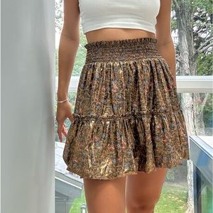 Shiny bronze skirt with Flower detail